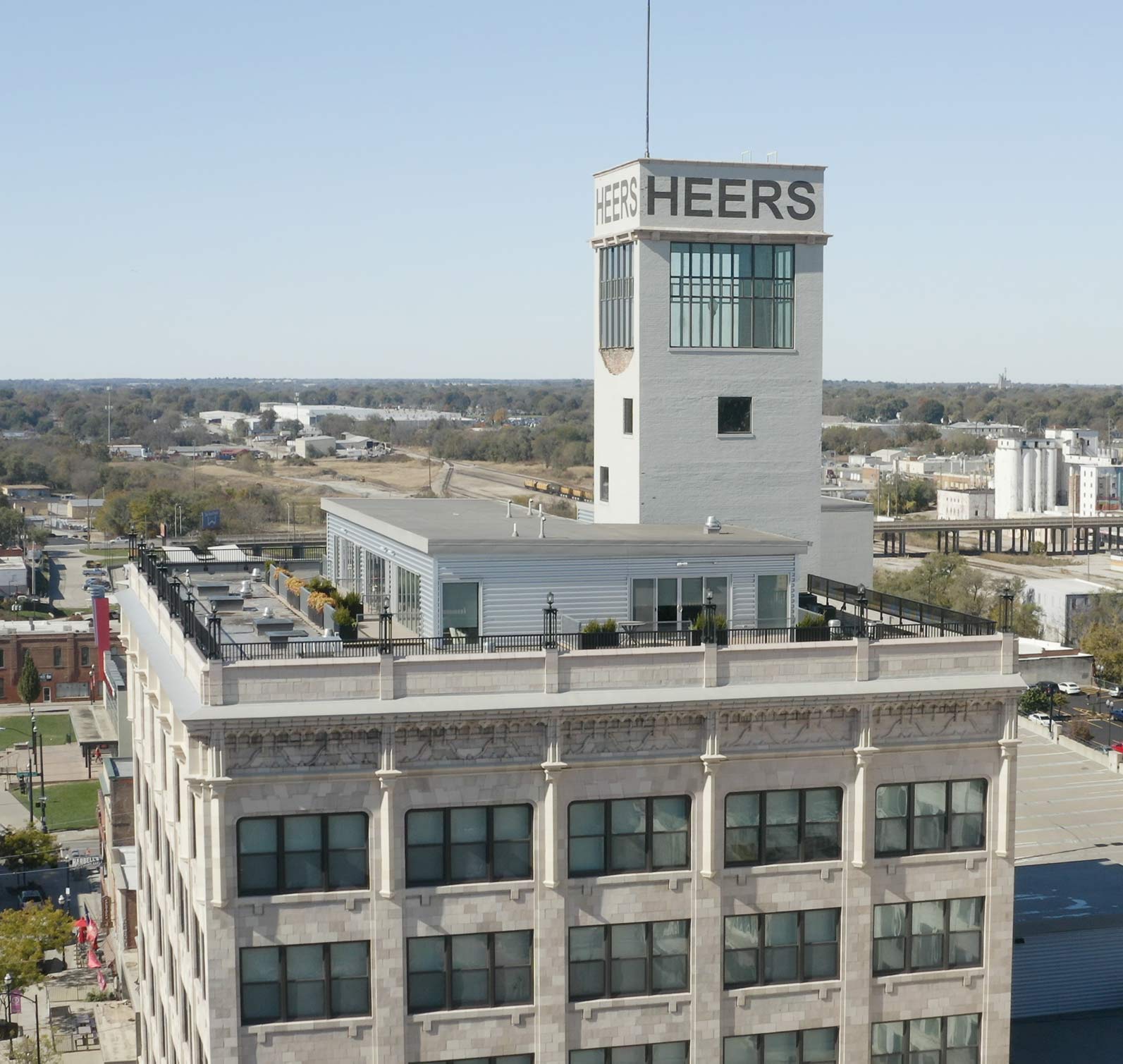 Aerial view of the historical Heers Luxury Living Apartments rooftop lounge